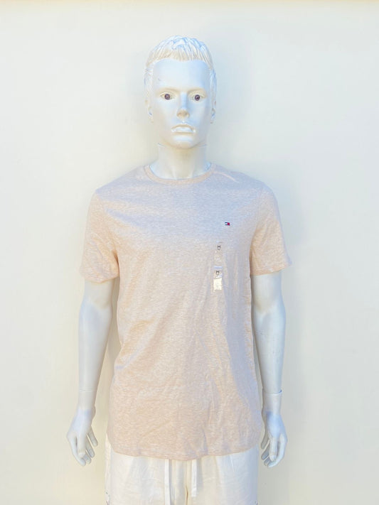 T-shirt Tommy Hilfiger Original, en color crema/beige con logotipo de la marca en el lado en pequeño.