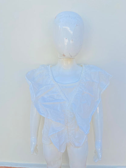 Blusa ZARA para niñas blanca con mangas con vuelo.