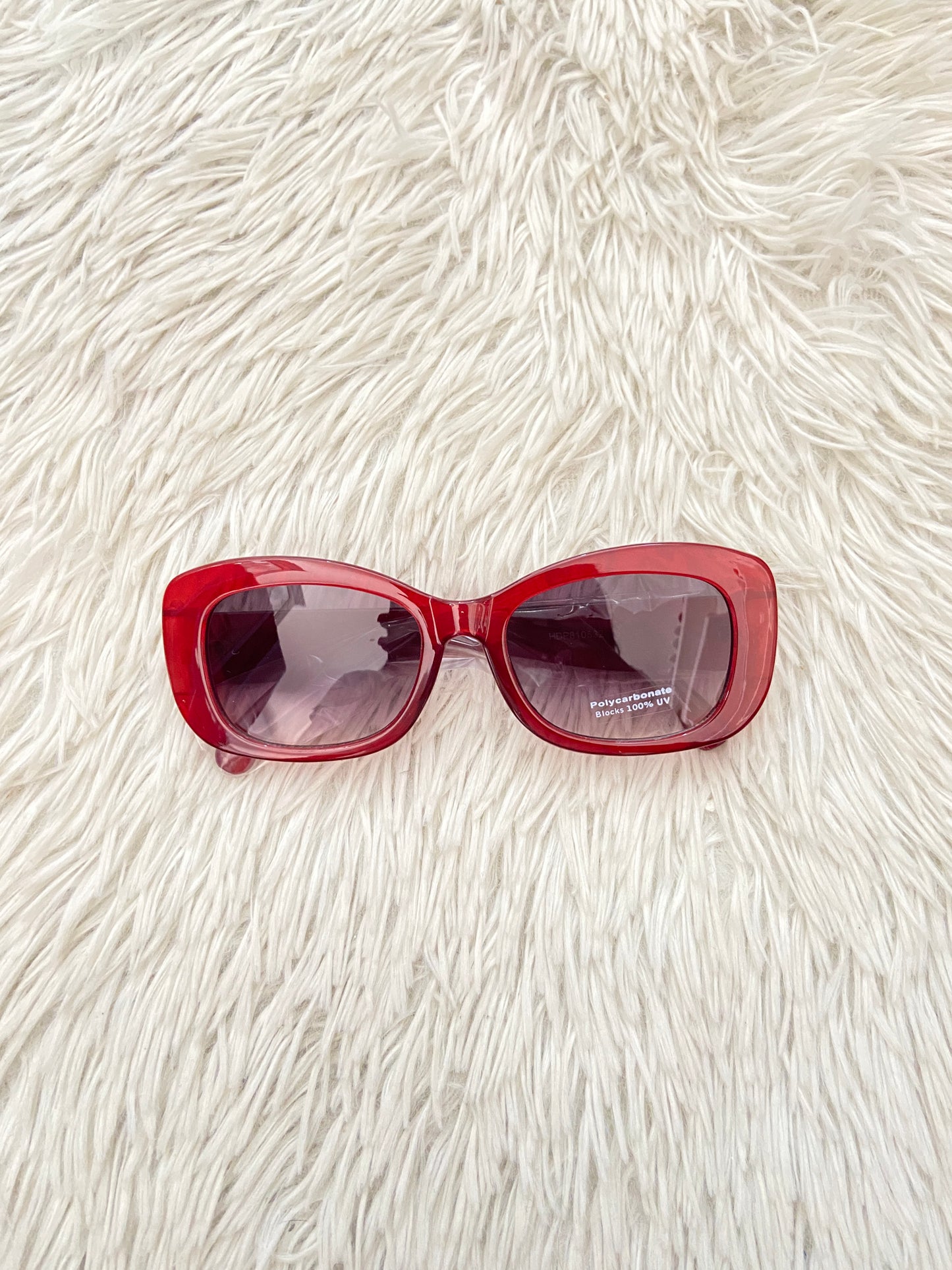 Lentes Fashion Nova original rojo vino con micas claras.