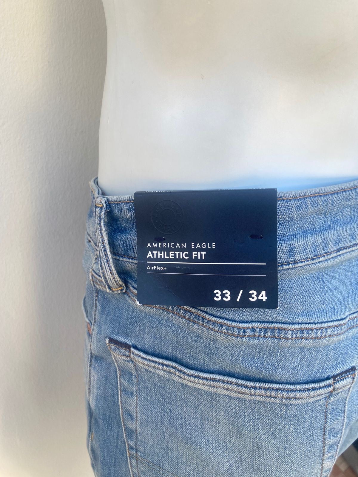 Pantalon jean AMERICAN EAGLE Original en color azul Airflex, ATHLETIC FIT.