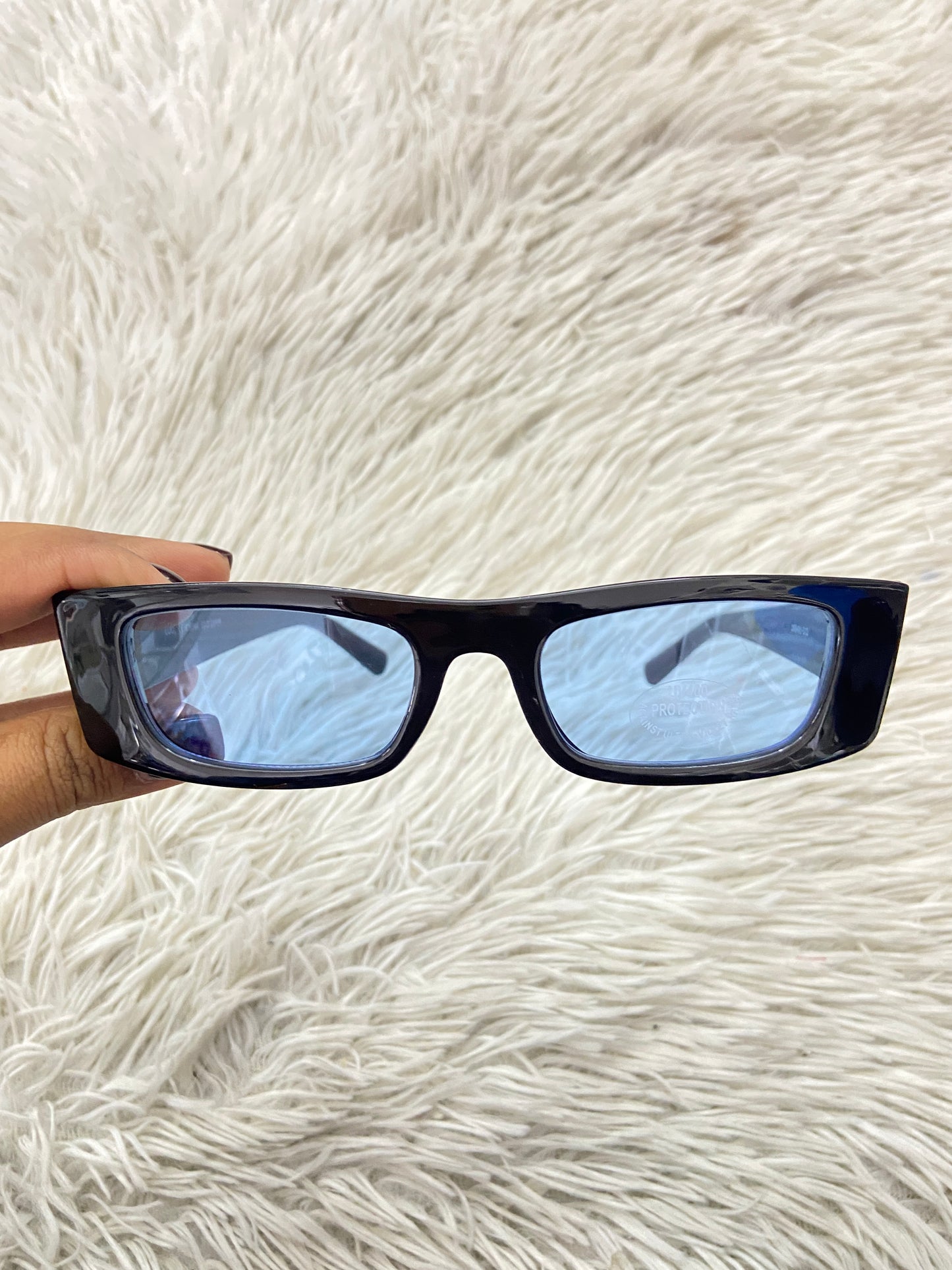 Lentes, negro con micas azul claro.