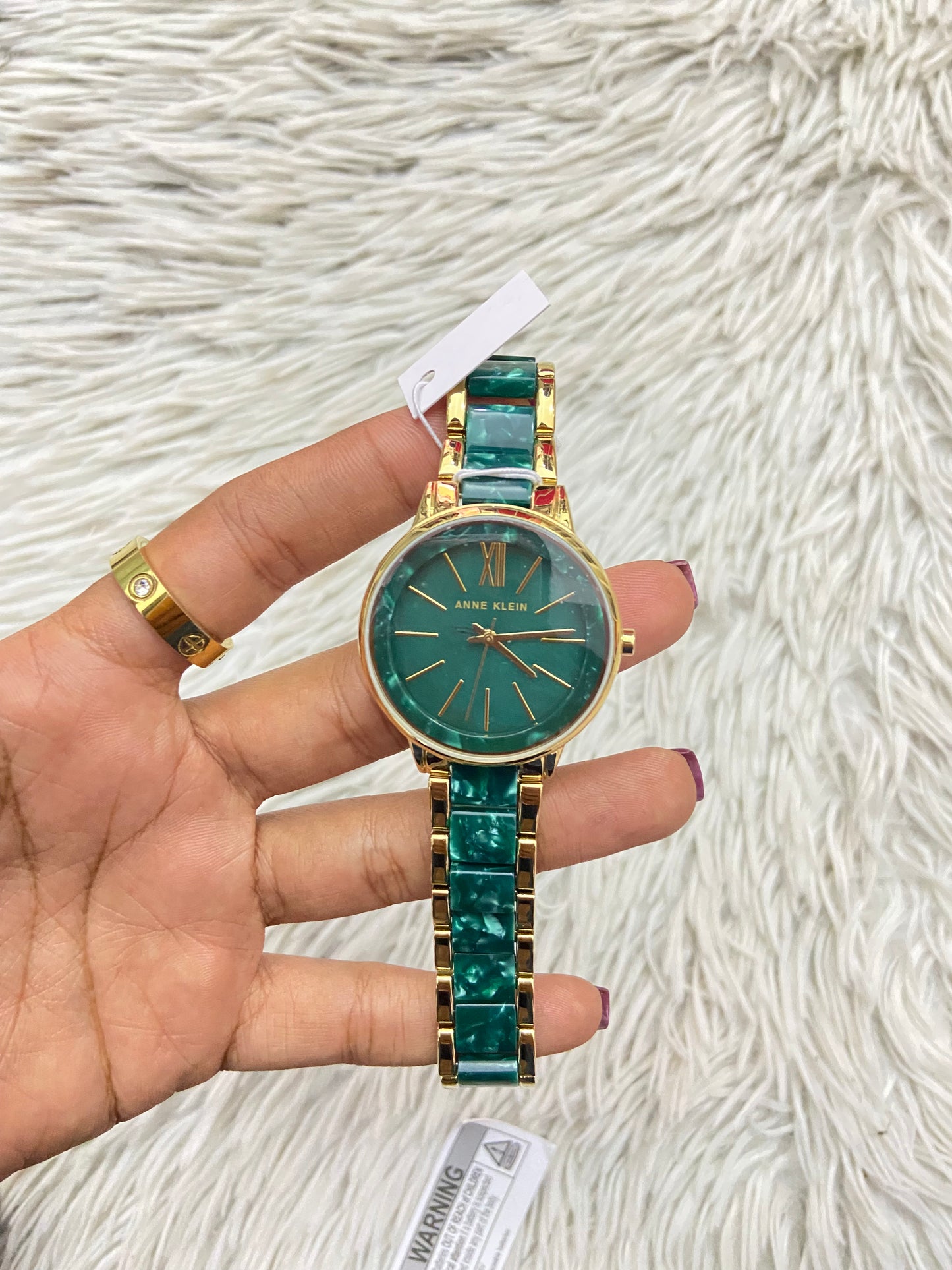 Reloj ANNE KLEIN original, color dorado con verde jade ( mármol ) con detalles dorados y verde.