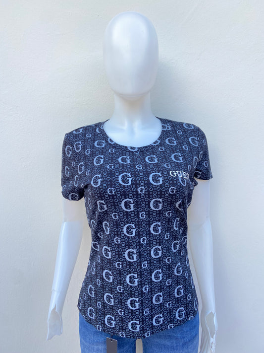 T-shirt GUESS original, negro con estampado de letras G en color gris.