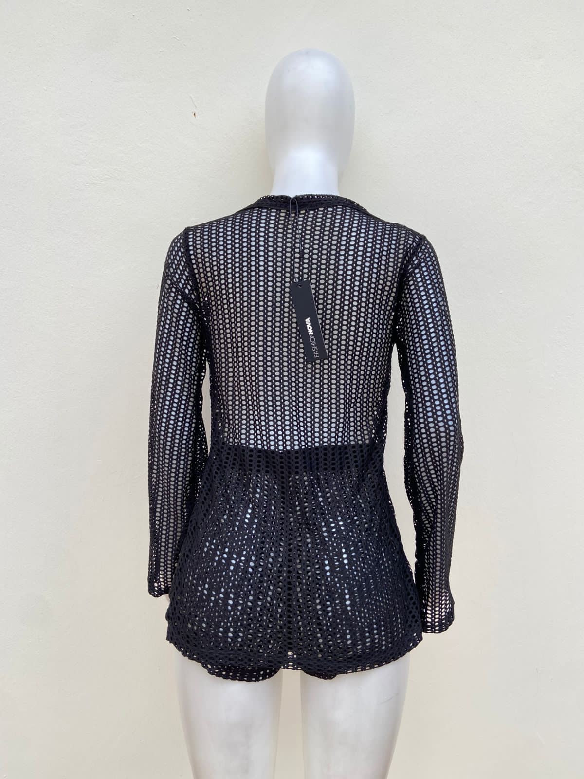 Conjunto/ Cover up, negro con hoyitos y lazos ajustables.