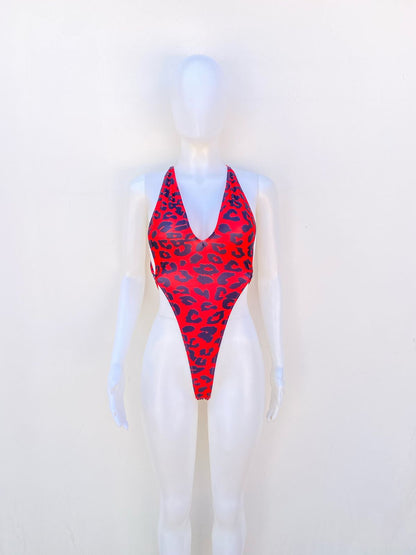 Biquini, de una pieza  ajustable rojo con estampado animal print