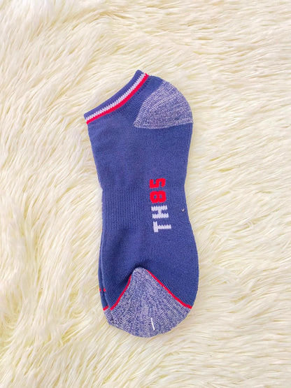 Medias TOMMY HILFIGER original, azul marino con letras TH 85 en rojo y blanco.