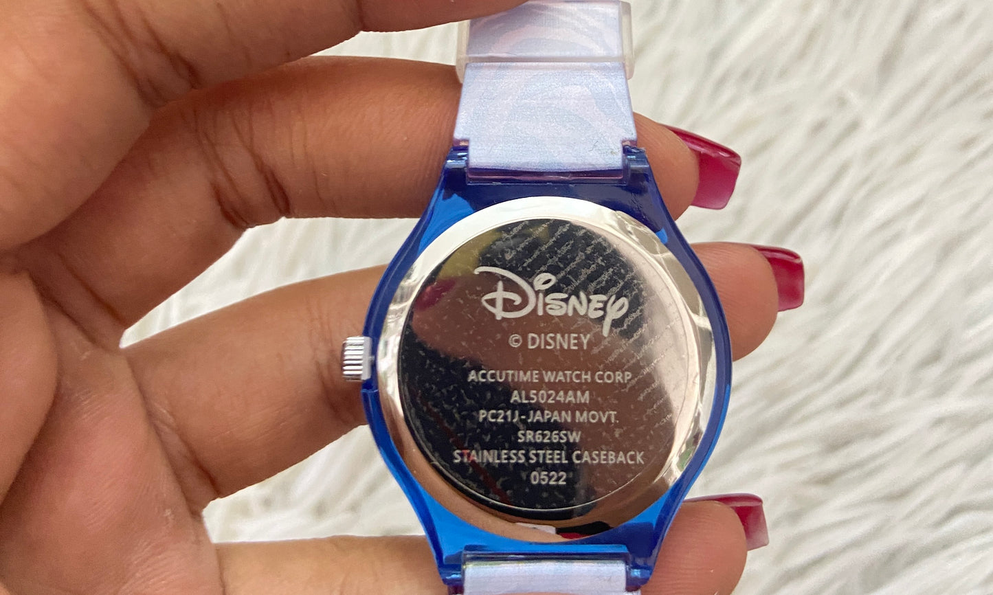 Reloj Disney original morado con azul marino y caricatura de un gato de fondo.