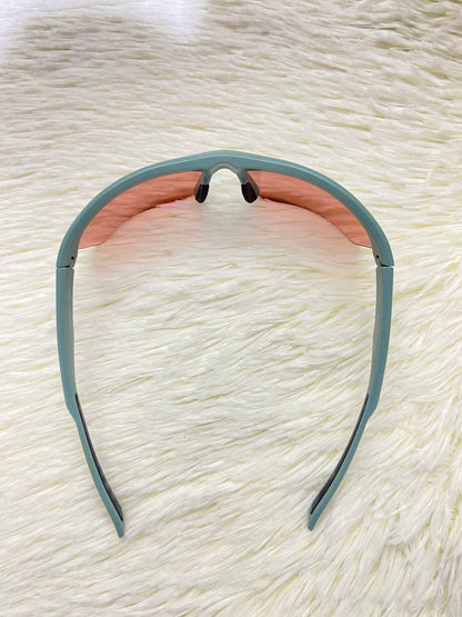 Lentes, verde sage con micas eñ color naranja transparente con protección UV  100%.