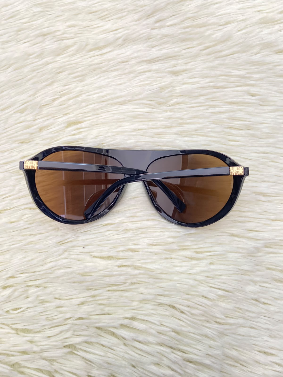 Lentes, marrones con micas en color  marrón claro, ovalados grandes.