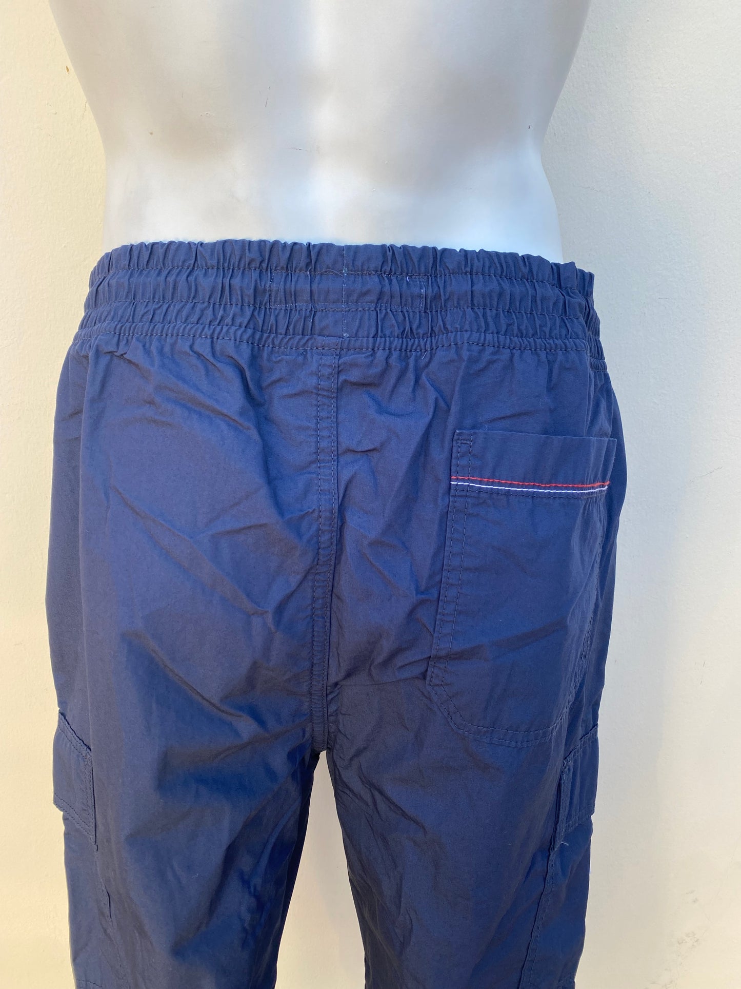 Jogger pantalón Tommy Hilfiger original azul con lazos blanco.