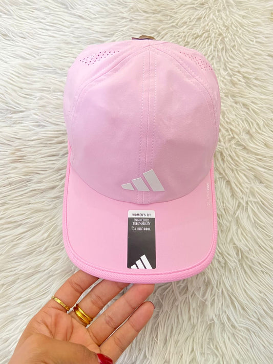 Gorra Adidas original, rosada  con logotipo de la marca en color blanco, ajustable.