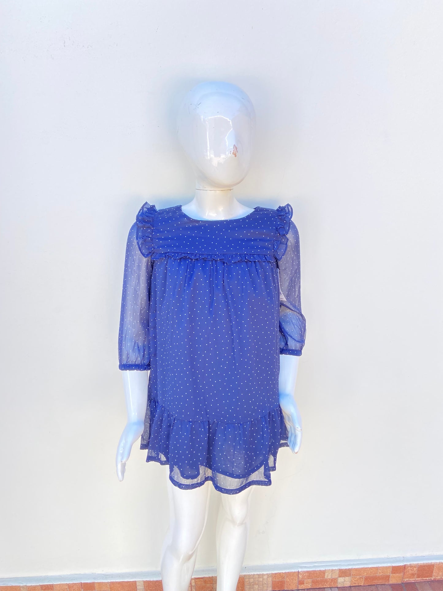 Vestido Oshkosh B’gosh original de color azul marino con diseño de puntos blancos mangas larga transparente pequeños vuelo en los hombros y al frente