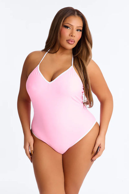 Biquini, rosado con bordes en color blanco y lazos ajustables, 1 pieza.