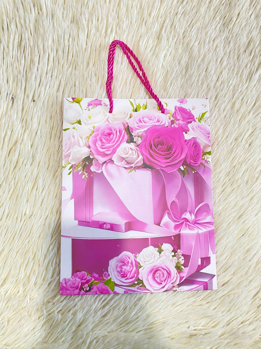 Shopping blanco con flores rosadas y blancas