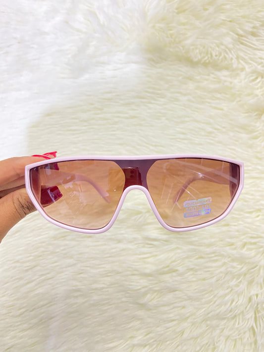 Lentes, rosado claros con micas en color marron y detalles en plateado, 100 % Polycarbonate y protección UV.