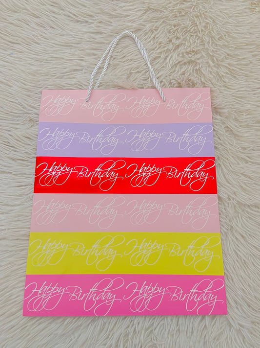 Shopping, rosado con rayas de colores y letras HAPPY BIRTHDAY, MEDIANO.