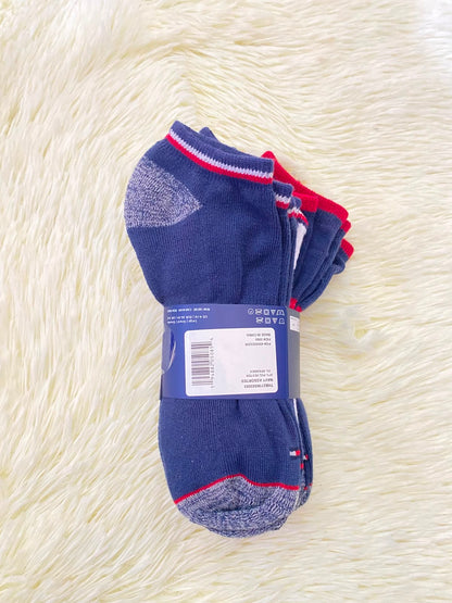 Medias TOMMY HILFIGER original, azul marino con letras TH 85 en rojo y blanco.