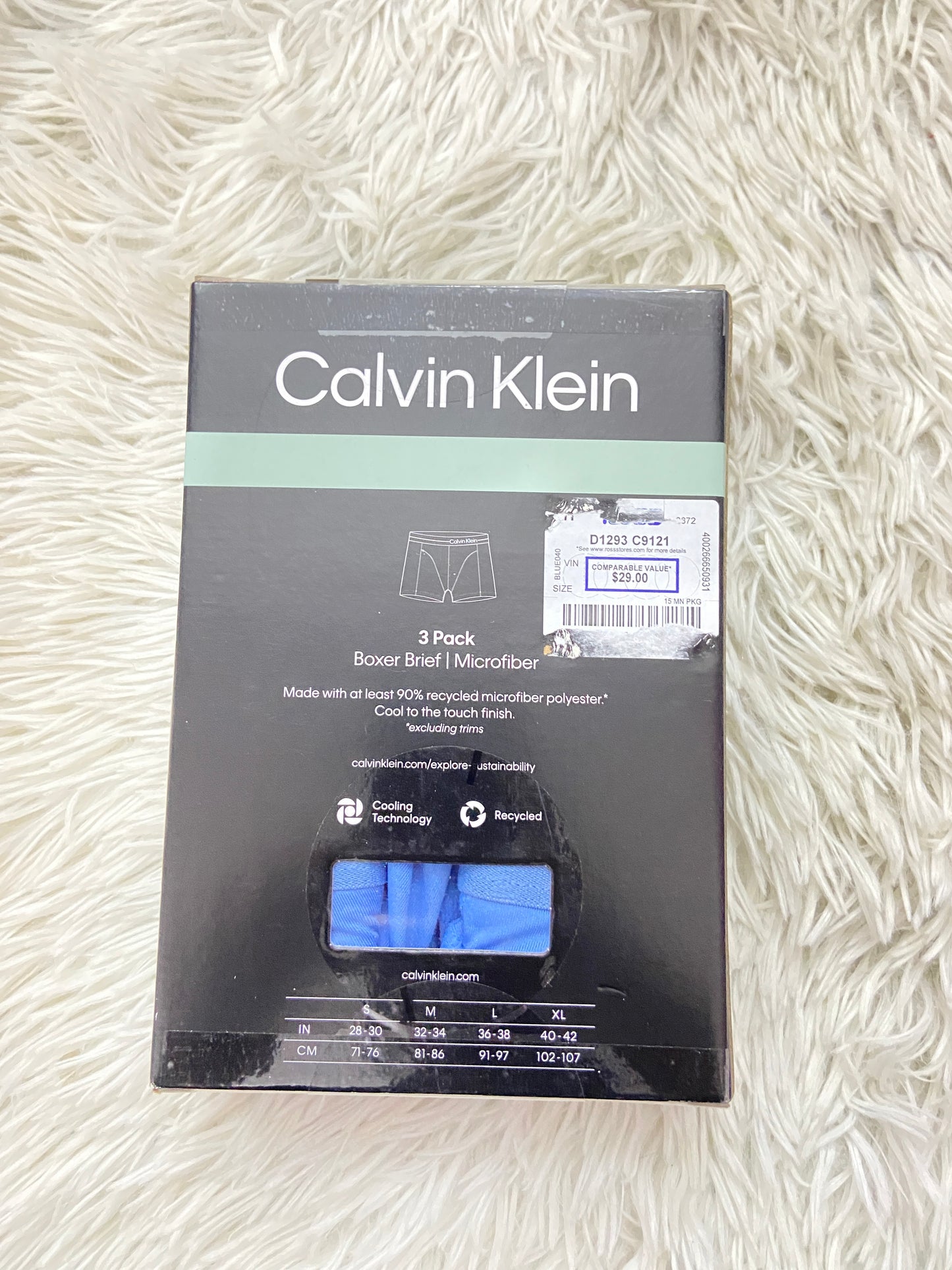 Boxer Calvin Klein original, pack de 3, diferentes tonos de azules y letras de la marca en negro.
