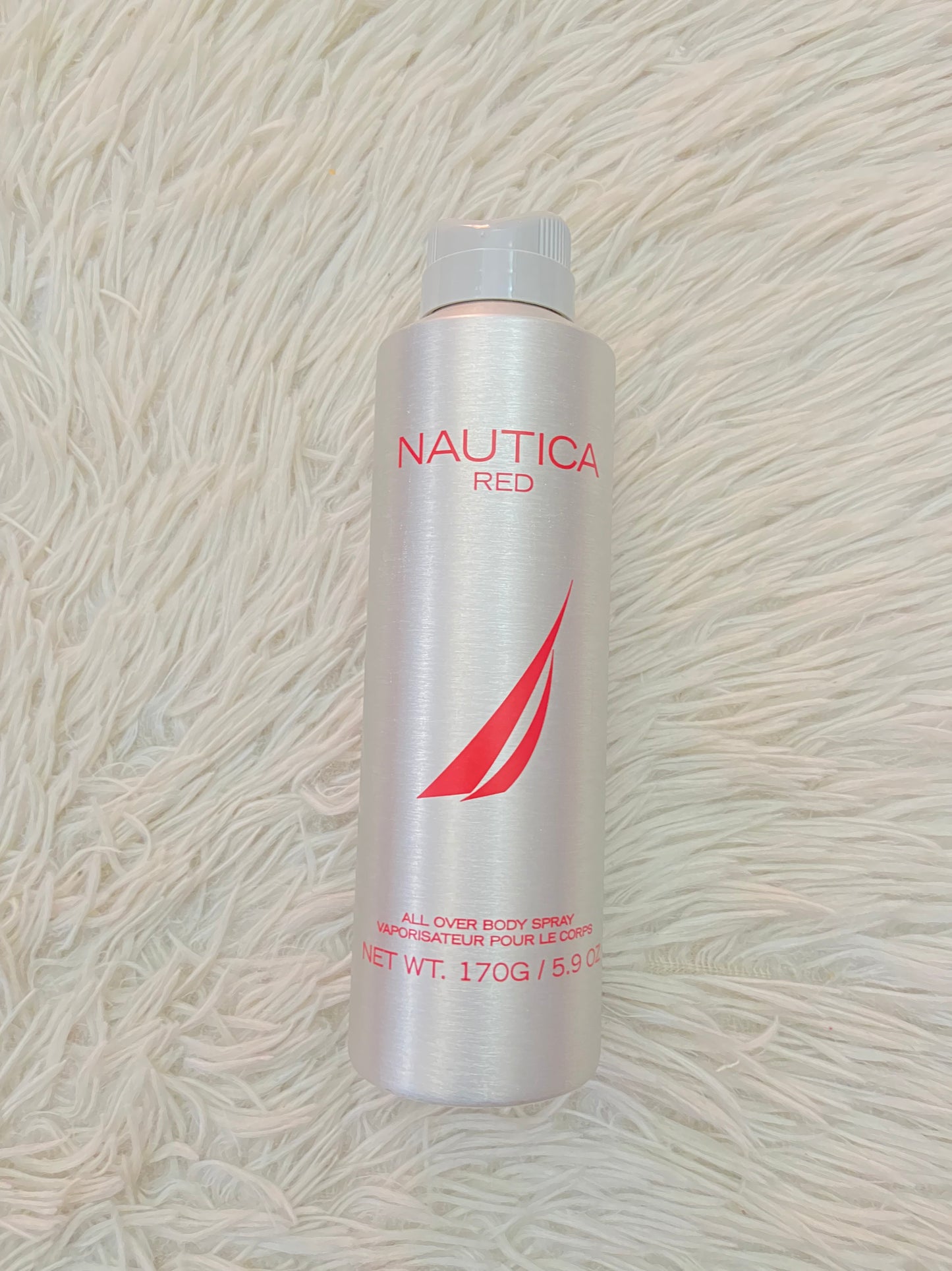 Set NAUTICA RED original, con desodorante y perfume en color rojo y plateado.