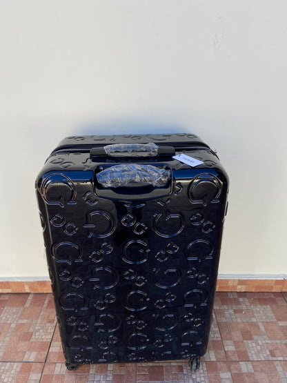 Maleta GUESS original, negra con la letra G y GUESS en plateado. Material ABS resistente al agua.  Mango telescópico ajustable.