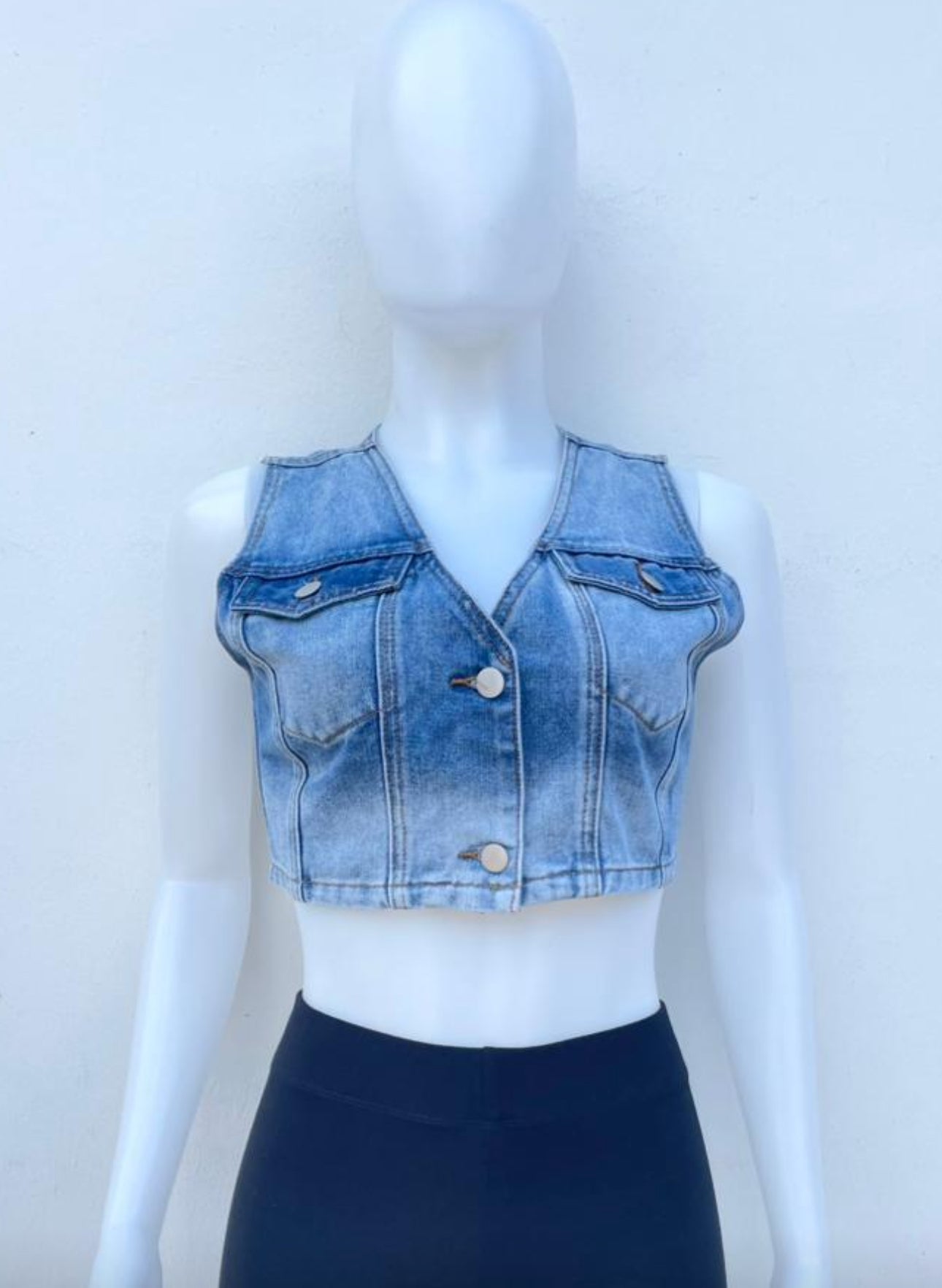 Top/Chaqueta Jean corta con reflejos azules