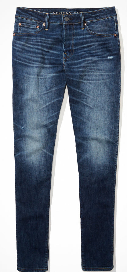 Pantalón Jean American Eagle original azul marino liso, con pequeño rasgado debajo del bolsillo, ATHLETIC SKINNY AIRFLEX + TEMP TECH