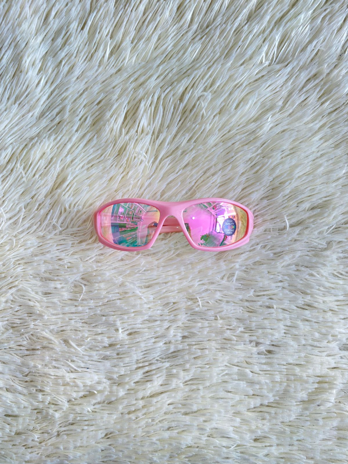 Lentes,con protección UV 100-400 para proteger tu visión. Rosados, estilo deportivo, con cristales espejados.