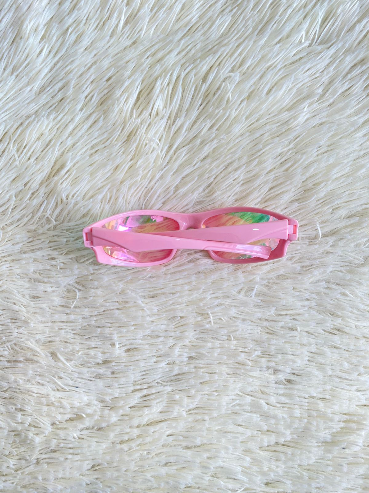 Lentes,con protección UV 100-400 para proteger tu visión. Rosados, estilo deportivo, con cristales espejados.