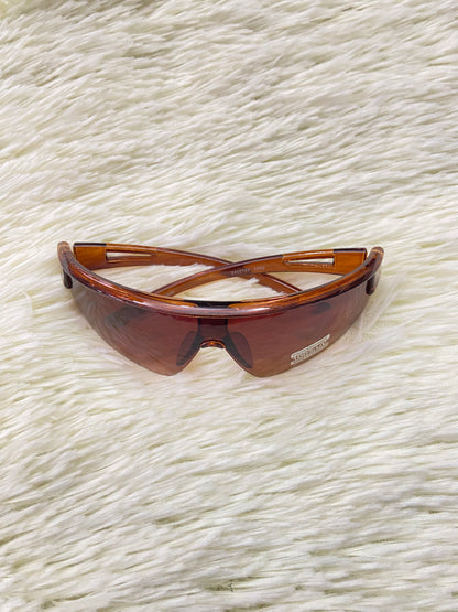 Lentes marrones, con micas claras + protección UV 100%.