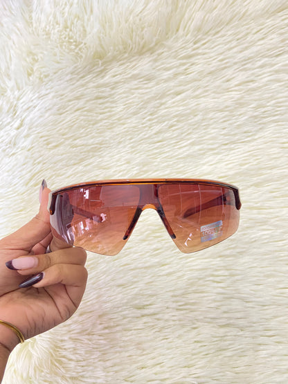 Lentes marrones, con micas claras + protección UV 100%.
