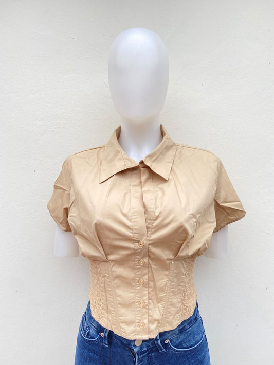 Blusa/ top color crema ( stone ), con botones en frente.