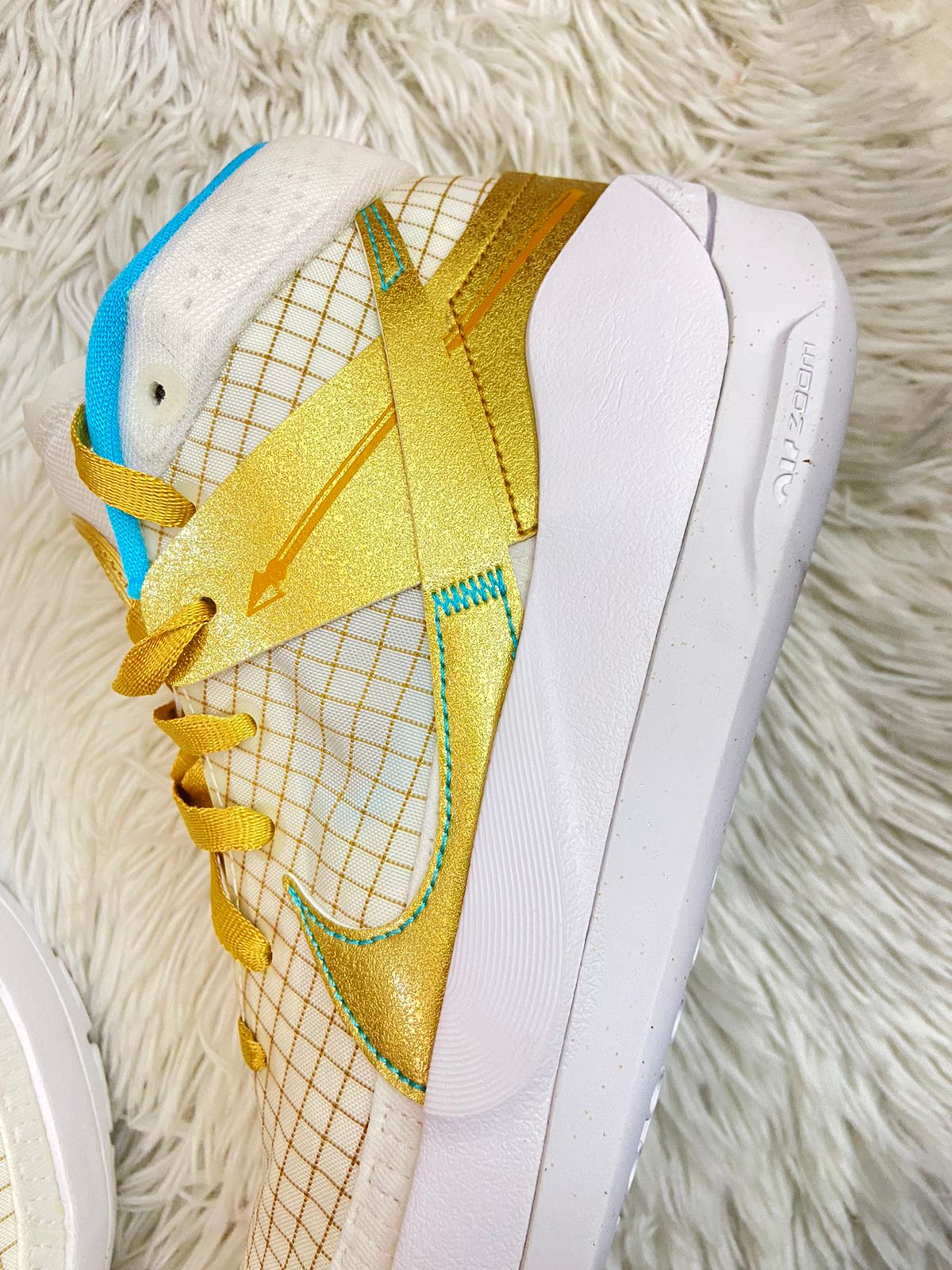 Tenis nike azul online con dorado