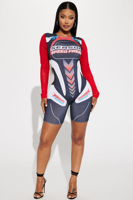 Enterizo motocicleta para mujer azul marino con rojo y letras SPEED FREAK.