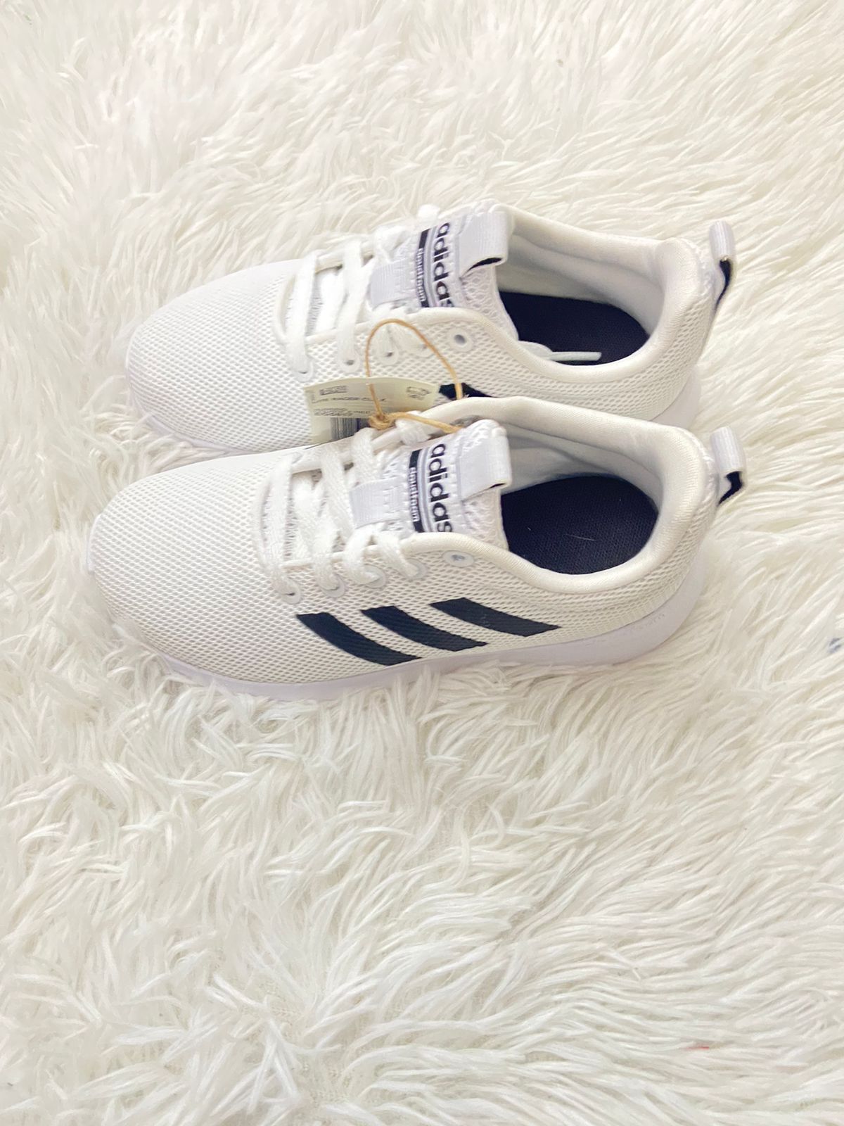 Adidas blancos clearance con lineas negras